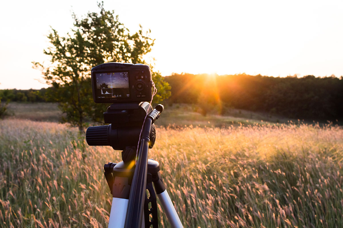 shoots sunset on a tripod