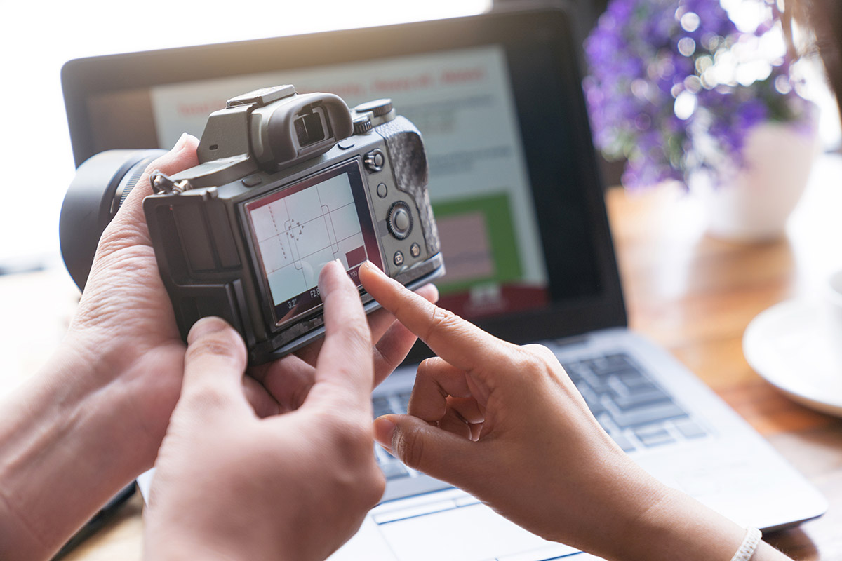 Teacher explaining College Student Studying Photography and came